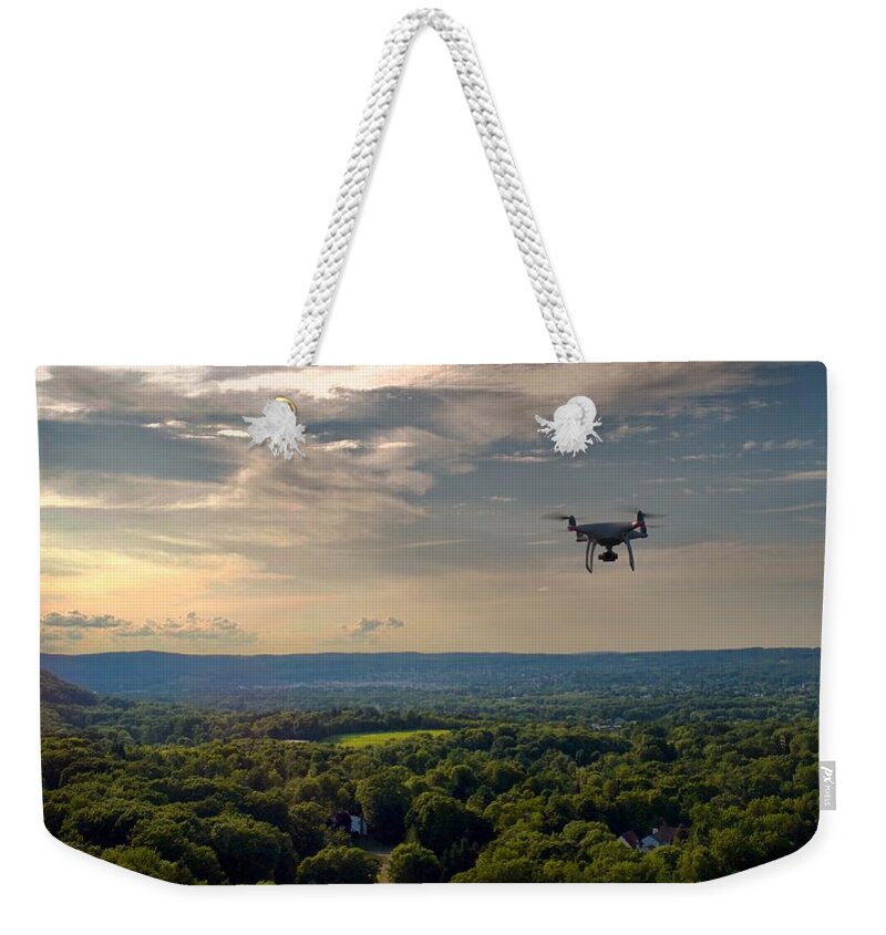 Drone Weekender Tote Bag featuring the photograph D R O N E by Anthony Giammarino
