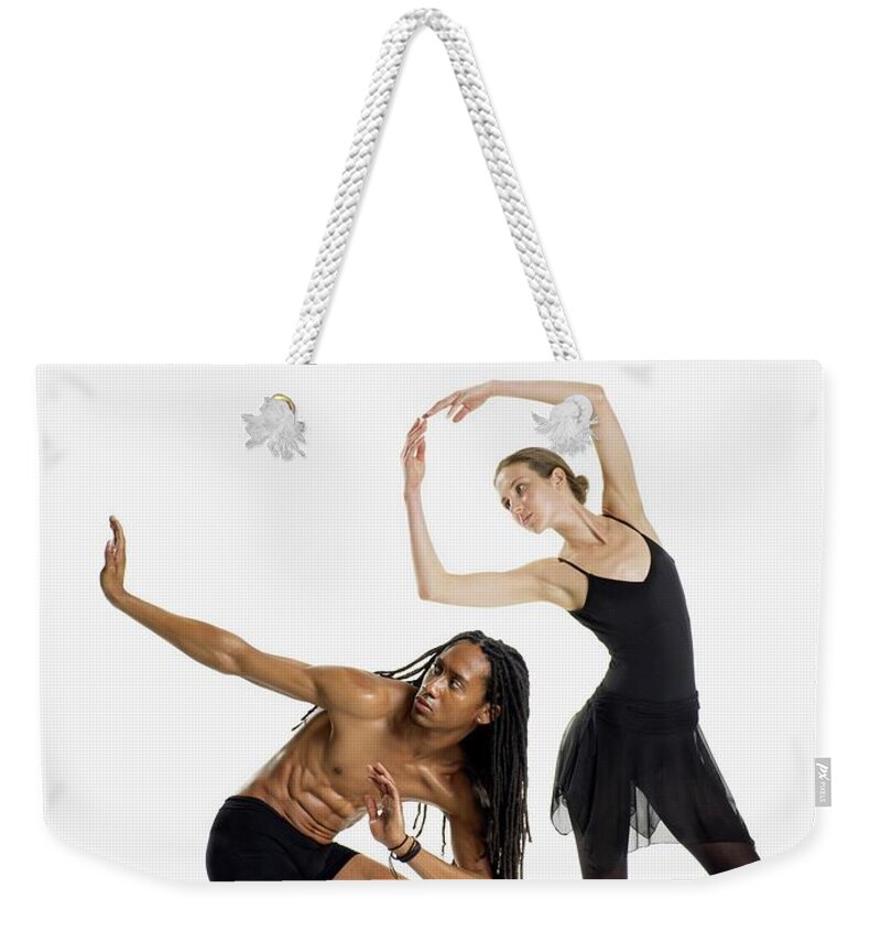 Young Men Weekender Tote Bag featuring the photograph Dancers Posing by Image Source