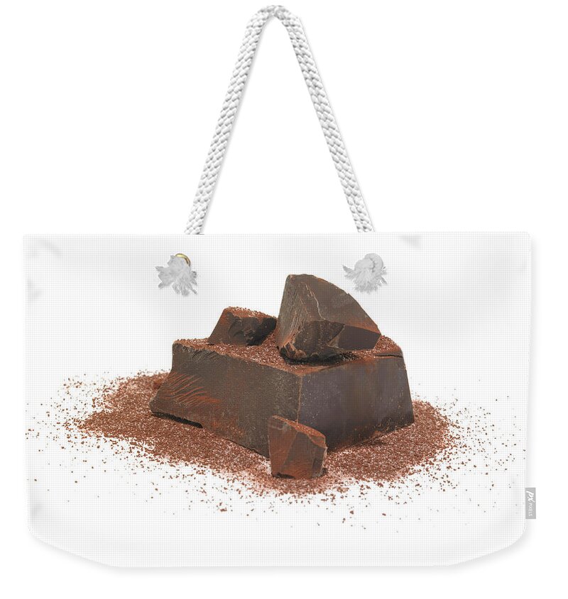 White Background Weekender Tote Bag featuring the photograph Dark Chocolate Chunks And Powder by James Worrell