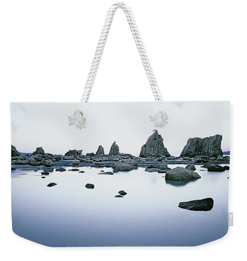 Scenics Weekender Tote Bag featuring the photograph Dawn Over Rugged Coastline In Wakayama by Micha Pawlitzki