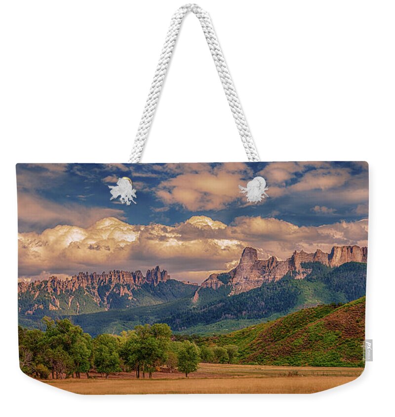 Cimarron Range Weekender Tote Bag featuring the photograph Days End at the Cimarron Mountains by Priscilla Burgers