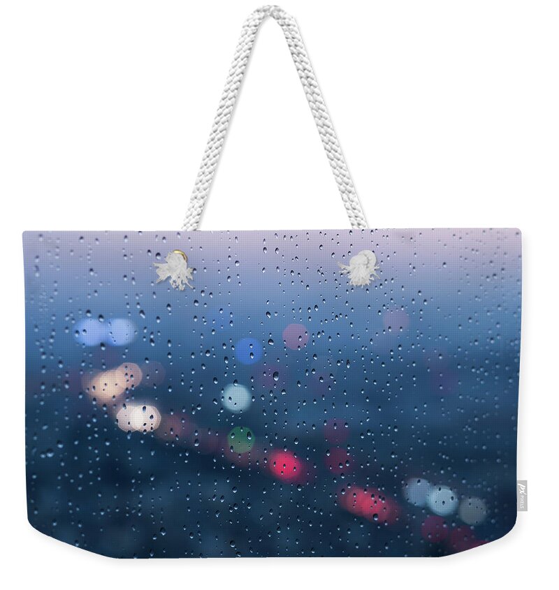 Tranquility Weekender Tote Bag featuring the photograph Defocused Lights And Water Droplets On by Miragec