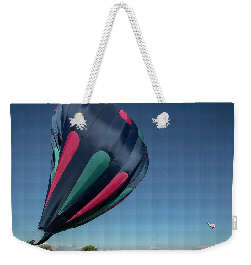 Tourism Weekender Tote Bag featuring the photograph Dented by Laura Hedien