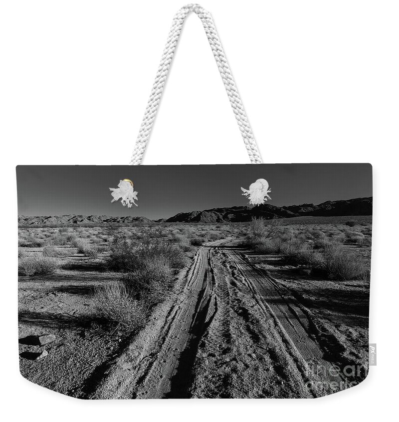 Chiriaco Weekender Tote Bag featuring the photograph Desert Road by Jeff Hubbard