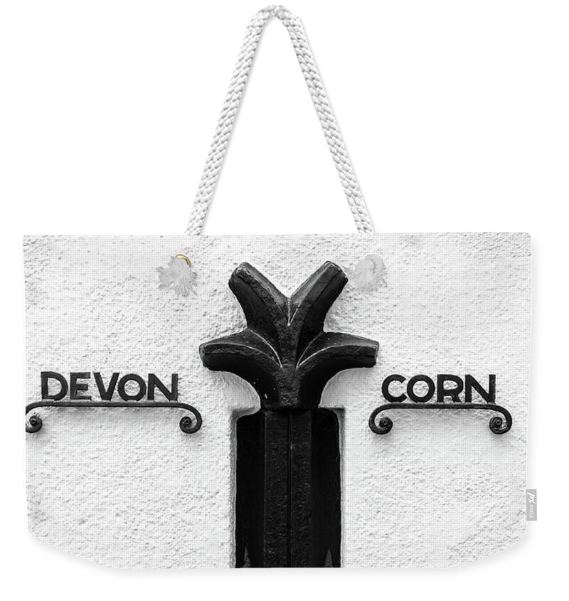 Cornwall Weekender Tote Bag featuring the photograph Devon Cornwall Boundary Marker by Helen Jackson
