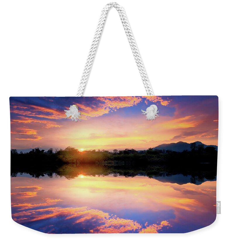 Sunset Weekender Tote Bag featuring the photograph Dialogues with the sea by Philippe Sainte-Laudy