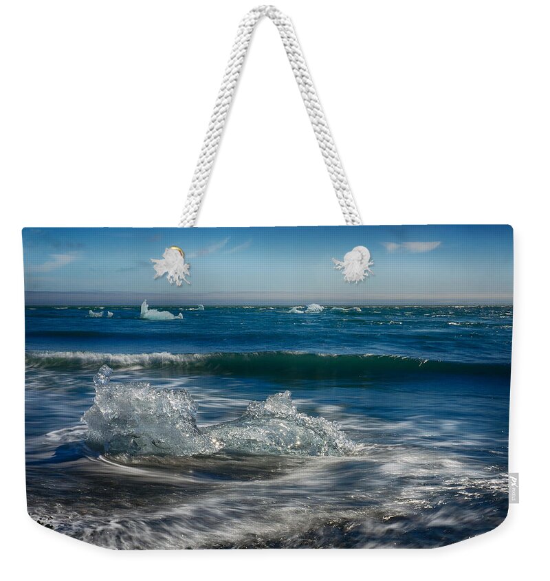 Iceland Weekender Tote Bag featuring the photograph Diamond on the Beach by Amanda Jones