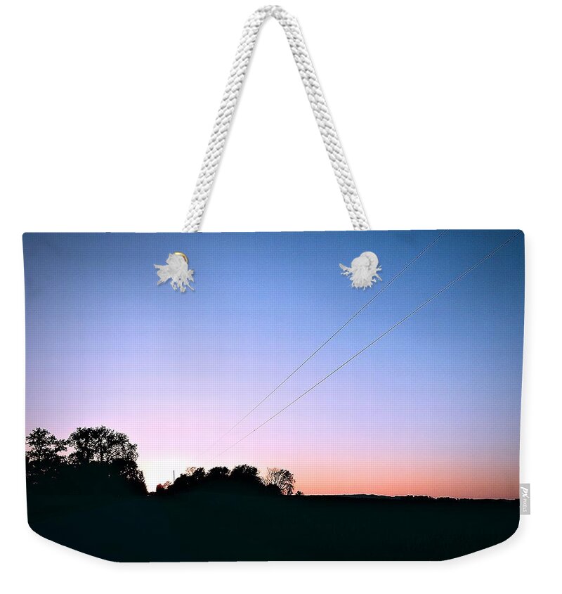 Sunset Weekender Tote Bag featuring the photograph Disappearing Lines by Wild Thing