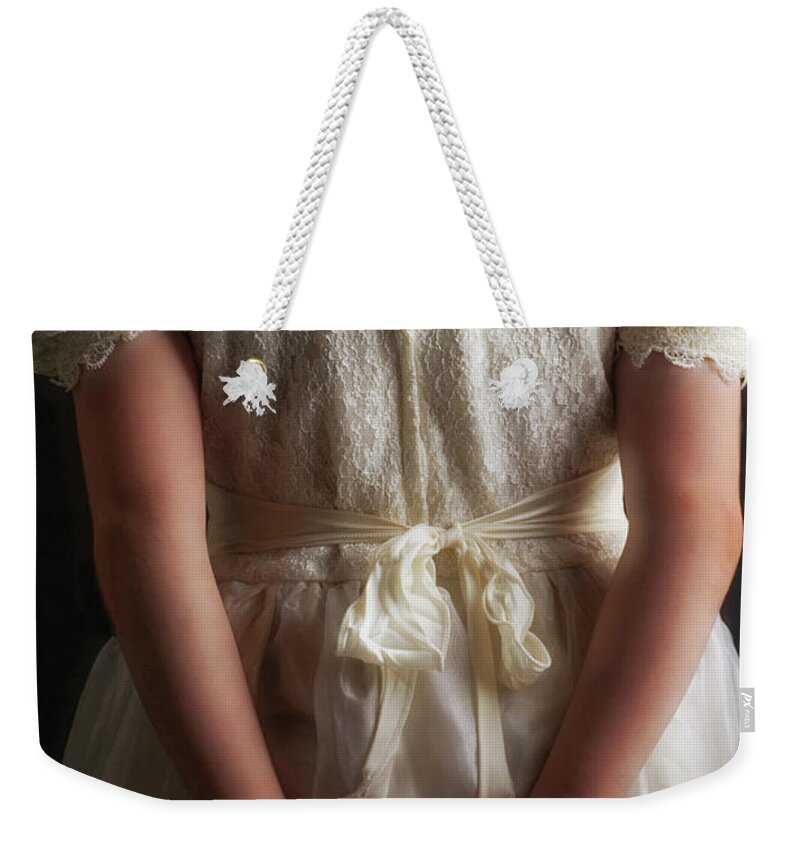 Girl Weekender Tote Bag featuring the photograph Dressed Up by Norma Warden