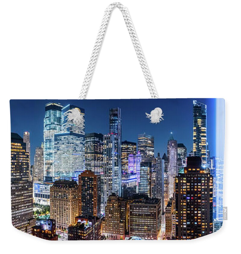 New York Weekender Tote Bag featuring the photograph Drone view panorama of downtown New York City by Mihai Andritoiu