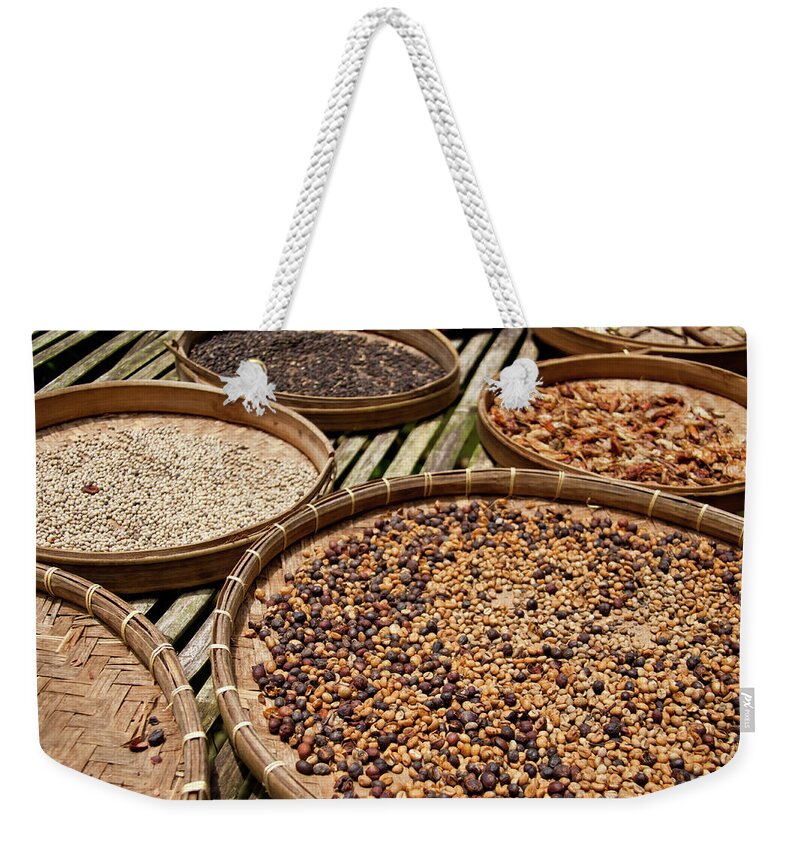 Outdoors Weekender Tote Bag featuring the photograph Drying Raw Coffee Beans At Plantation by Melissa Tse