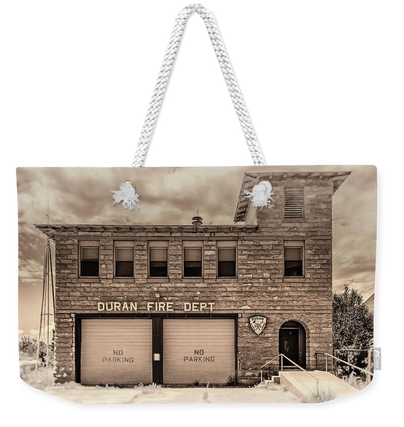  Weekender Tote Bag featuring the photograph Duran Fire Dept by Lou Novick