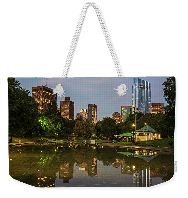 Boston Weekender Tote Bag featuring the photograph Dusk at the Boston Common Frog Pond Skyline Reflection by Toby McGuire