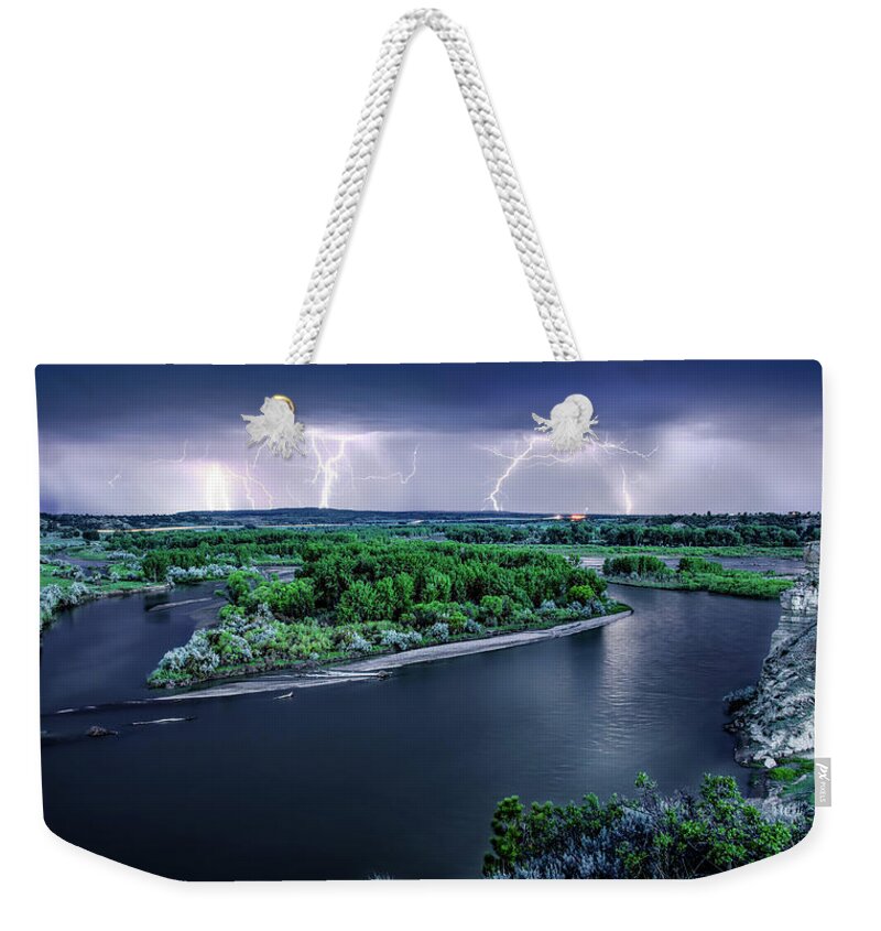 Nature Weekender Tote Bag featuring the photograph East Montana Lightning Storm by Leland D Howard