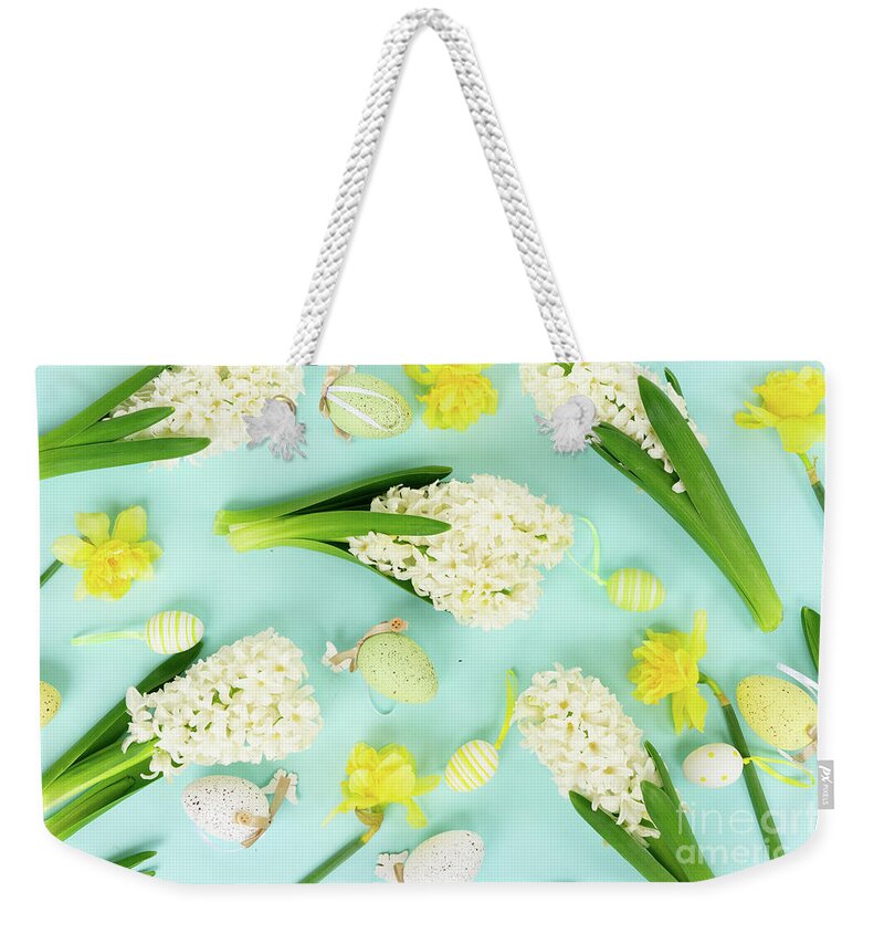 Easter Weekender Tote Bag featuring the photograph Easter on Blue by Anastasy Yarmolovich