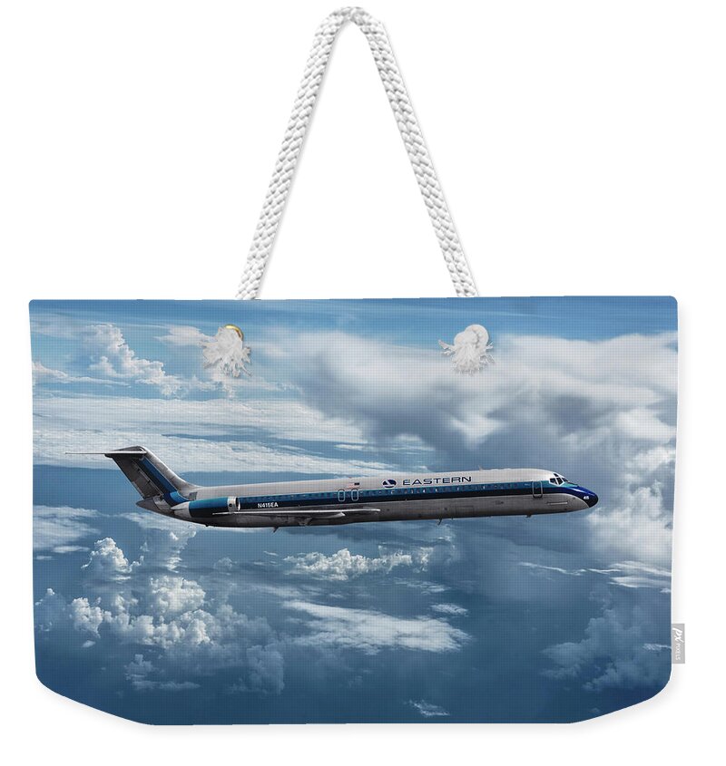 Eastern Airlines Weekender Tote Bag featuring the mixed media Eastern Airlines DC-9 Among the Clouds by Erik Simonsen