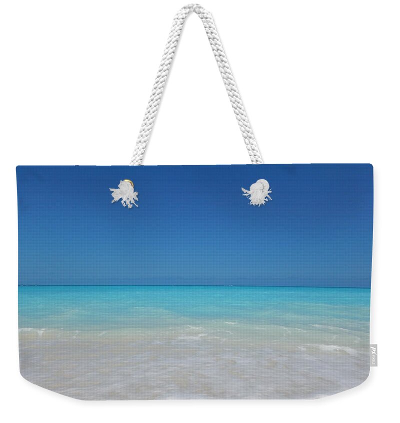 Beach Weekender Tote Bag featuring the photograph Easy on the eyes by Patricia Caron