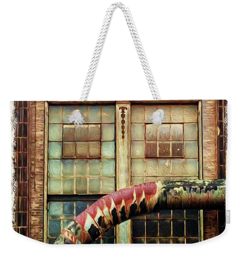 Warehouse Weekender Tote Bag featuring the photograph Ediface by Peggy Dietz