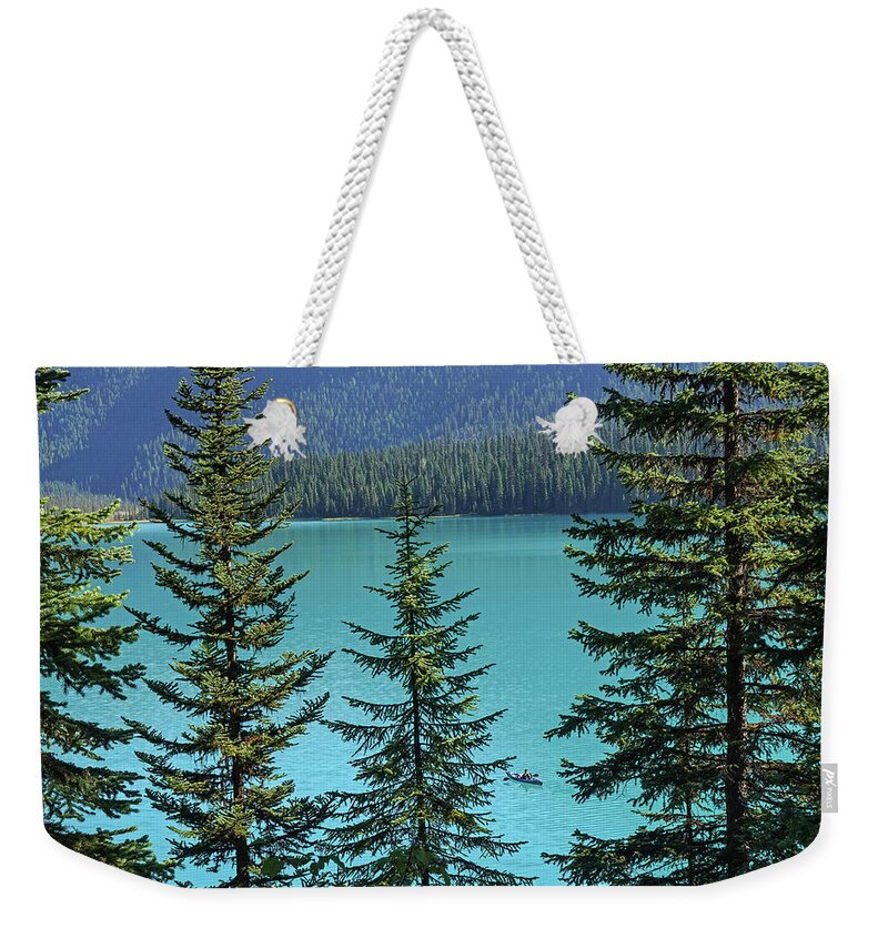 Emerald Weekender Tote Bag featuring the photograph Emerald Lake Kayaking Beautiful Blue Water Yoho National Park British Columbia Canada by Toby McGuire