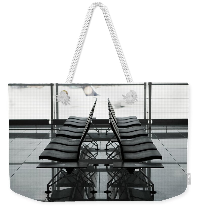 Empty Weekender Tote Bag featuring the photograph Empty Airport Waiting Room B&w by Pnc
