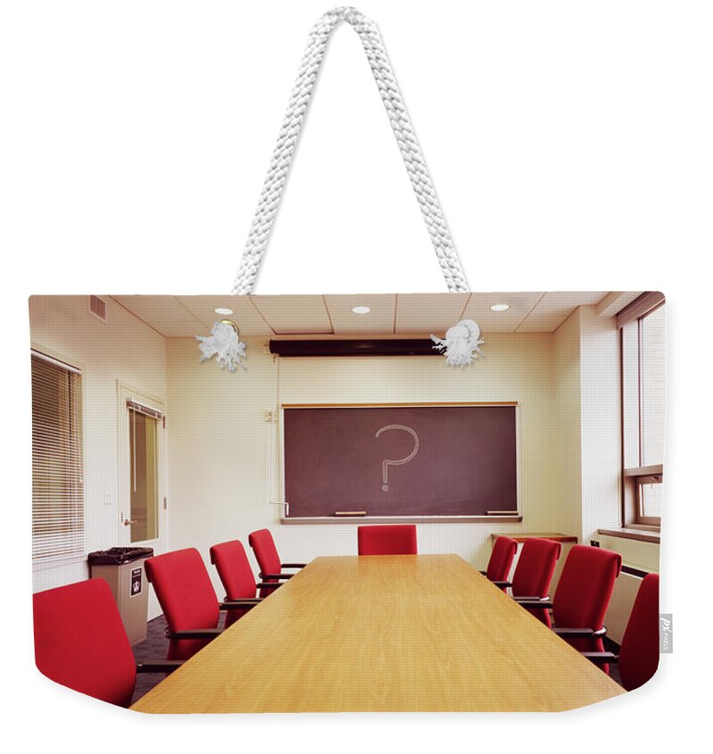 Photography Weekender Tote Bag featuring the photograph Empty Conference Table In An Office by Panoramic Images
