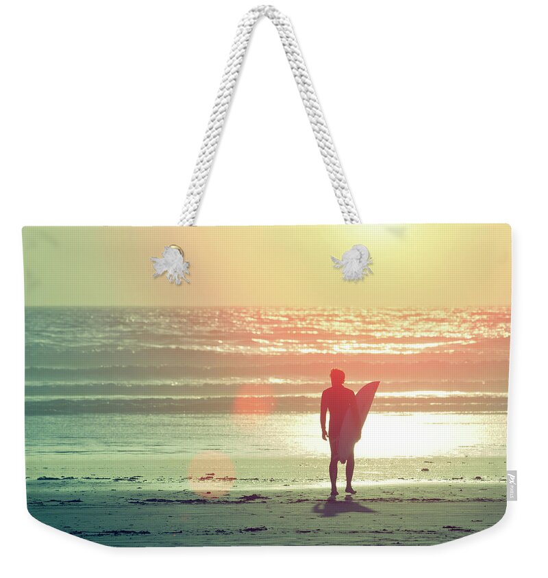 Shadow Weekender Tote Bag featuring the photograph Evening Surfer by Paul Mcgee