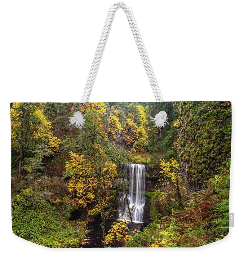 Silver Falls Weekender Tote Bag featuring the photograph Fall colors at the falls by Ulrich Burkhalter