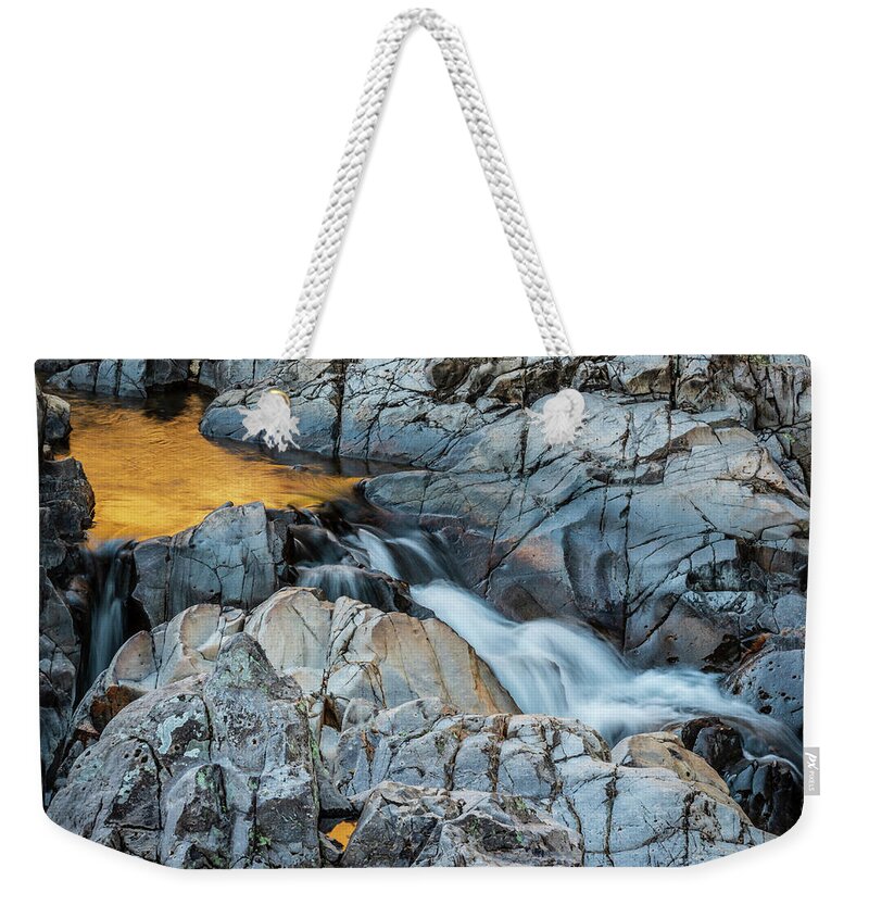 Johnson Shut Ins State Park Weekender Tote Bag featuring the photograph Fall colors tumble through Johnson Shut-ins State Park in Mo. by Jack Clutter