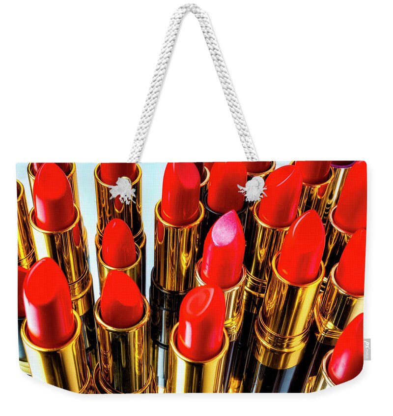 Cosmetics Weekender Tote Bag featuring the photograph Fashionable Red Lipstick by Garry Gay