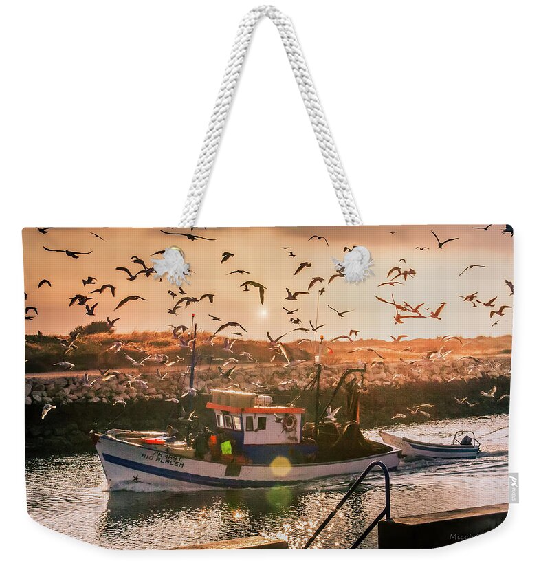 Seagulls Weekender Tote Bag featuring the photograph Feeding seagulls in the morning by Micah Offman