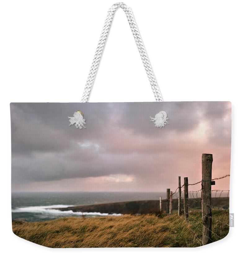 Tranquility Weekender Tote Bag featuring the photograph Fence In Ireland by Danielle D. Hughson