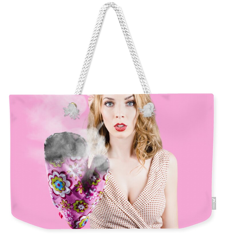 Cook Weekender Tote Bag featuring the photograph Fifties house wife gesturing a cooking time out by Jorgo Photography