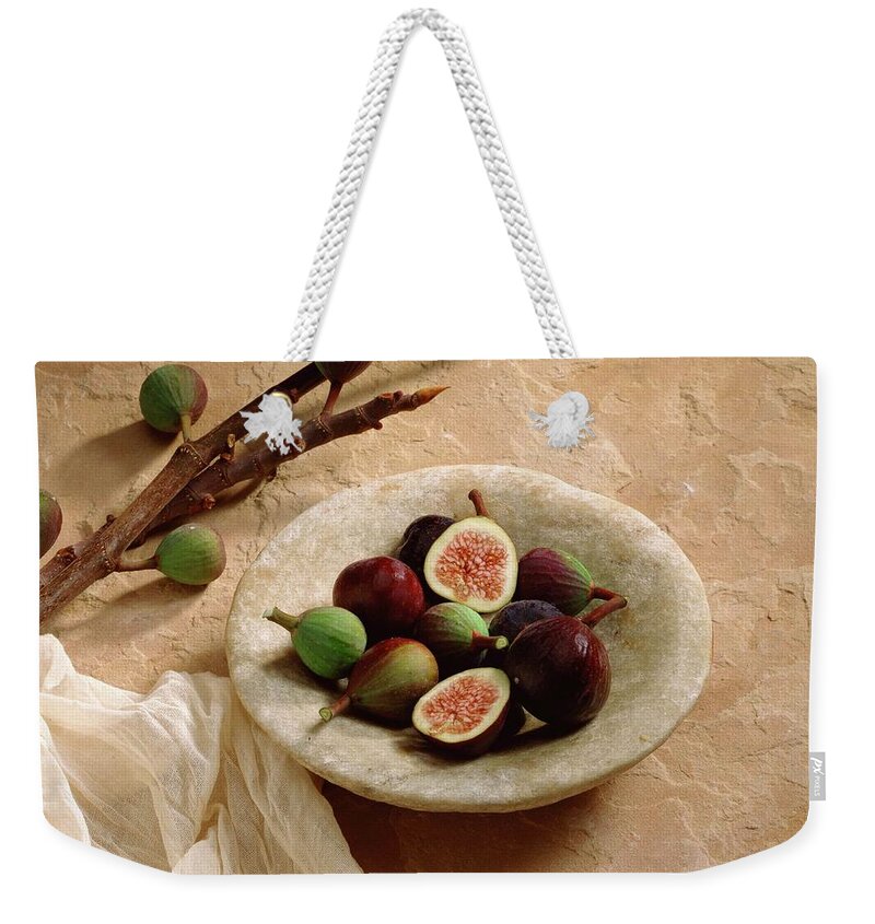 Healthy Eating Weekender Tote Bag featuring the photograph Figs In Bowl by Jupiterimages