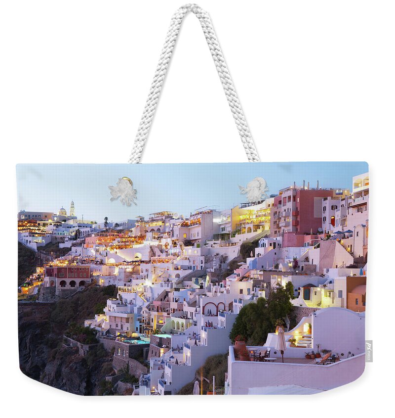 Architectural Feature Weekender Tote Bag featuring the photograph Fira At Night by Svetikd
