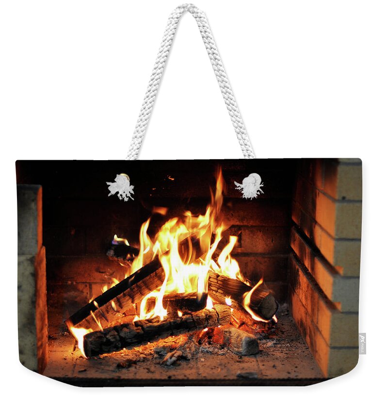 Domestic Room Weekender Tote Bag featuring the photograph Fireplace by Seastudio