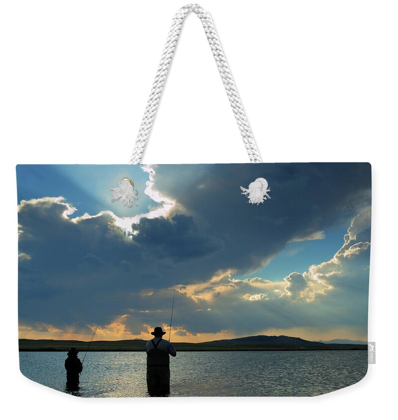 Three Quarter Length Weekender Tote Bag featuring the photograph Fishing by Arina Habich