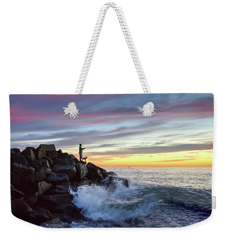 Tamarack Beach Weekender Tote Bag featuring the photograph Fishing at Sunset by Ann Patterson