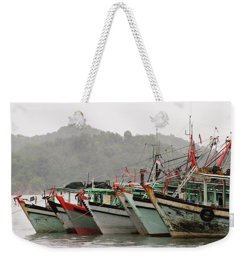 Island Of Borneo Weekender Tote Bag featuring the photograph Fishing Boats In The Rain by Cp Cheah