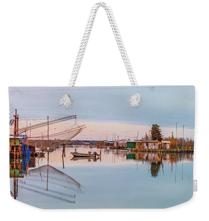 Boats Weekender Tote Bag featuring the photograph Fishing Huts On The Sea Water Lagoon by Vivida Photo PC