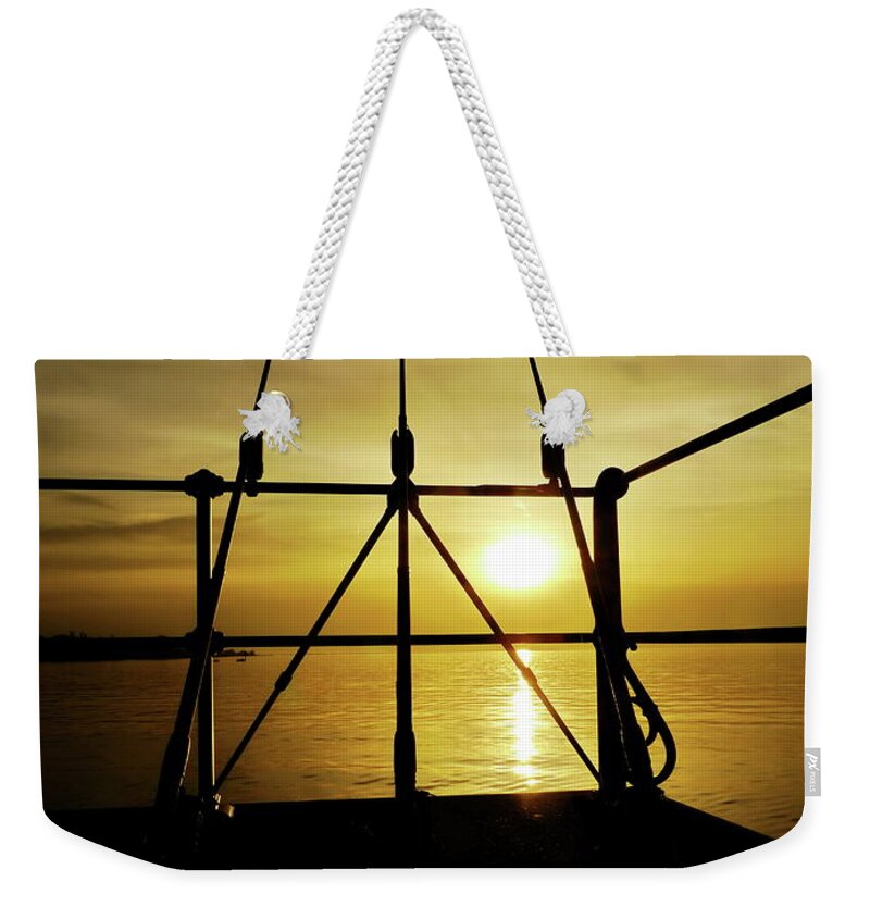 Leaning Weekender Tote Bag featuring the photograph Fishing Rods by Rolfo