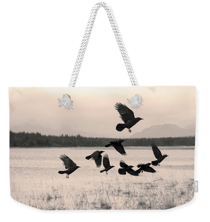 Animal Weekender Tote Bag featuring the photograph Flock of crows moving on by Michele Cornelius