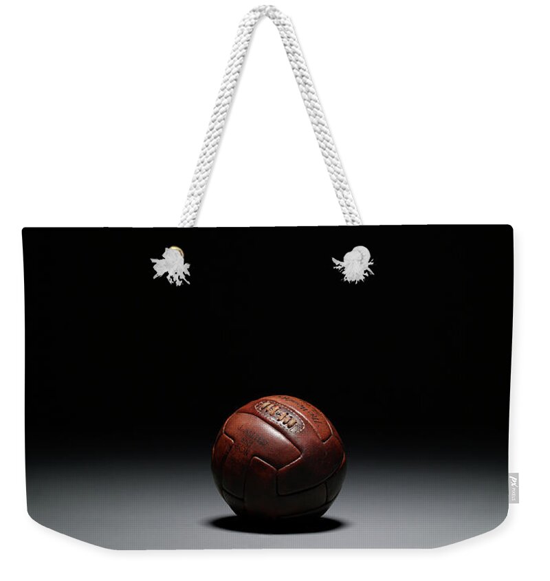 Ball Weekender Tote Bag featuring the photograph Football, Studio Shot by Max Oppenheim