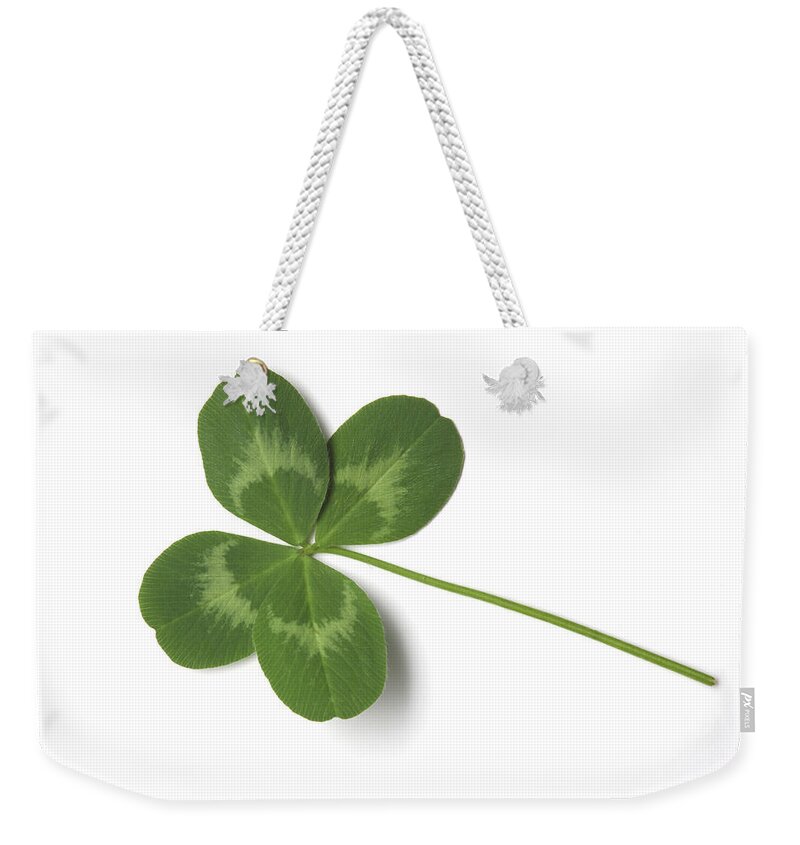 Good Luck Charm Weekender Tote Bag featuring the photograph Four-leaf Clover, A Sign Of Luck by Vincenzo Lombardo