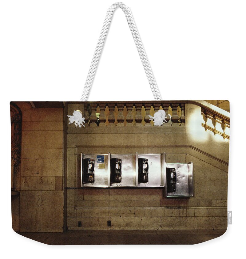 Pay Phone Weekender Tote Bag featuring the photograph Four Telephone Booths On Marble Wall by Herb Schmitz