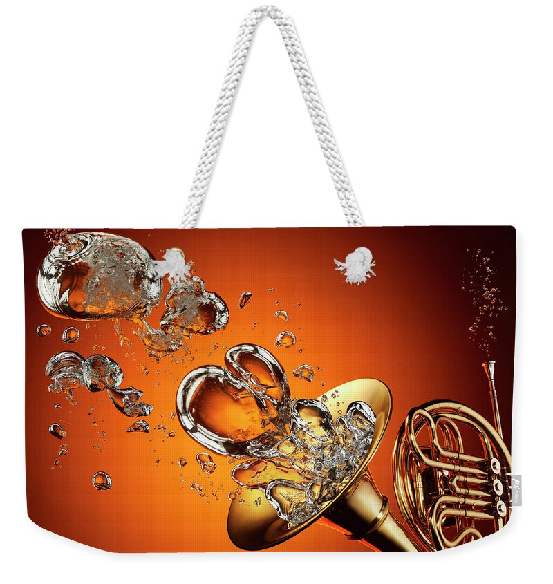 Orange Color Weekender Tote Bag featuring the photograph French Horn With Water Bubbles by Jack Andersen