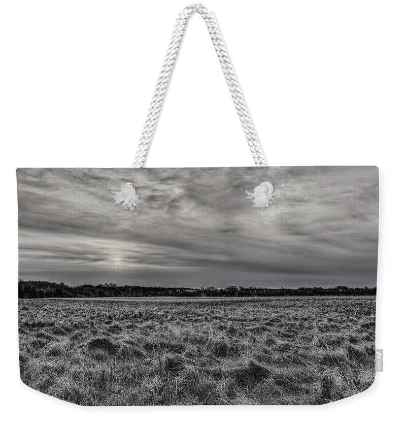 Black And White Weekender Tote Bag featuring the photograph Frosty Hay Field Black And White by Dale Kauzlaric