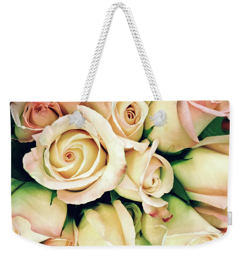 Petal Weekender Tote Bag featuring the photograph Full Frame Cross Processed Rose Bouquet by Travelif