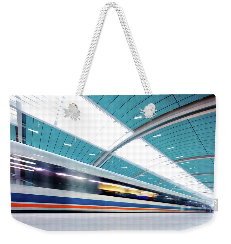 Aerodynamic Weekender Tote Bag featuring the photograph Futuristic Train by Nikada
