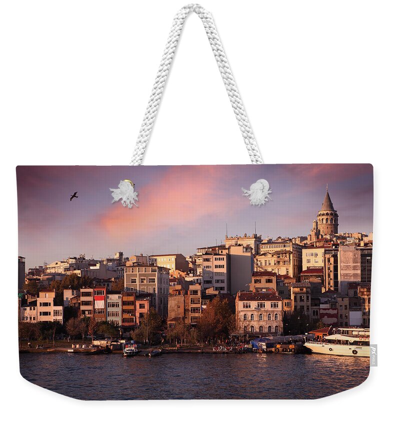 Istanbul Weekender Tote Bag featuring the photograph Galata Tower And Beyoglu District In by Narvikk