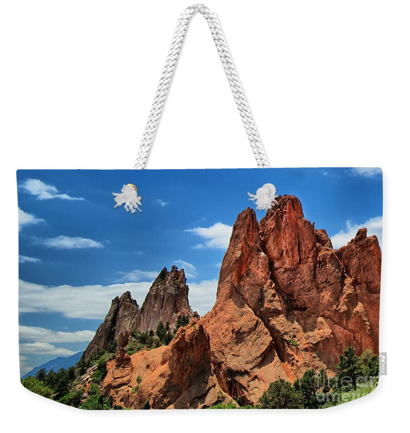 Badlands Weekender Tote Bag featuring the photograph Garden of the Gods by Bill Frische